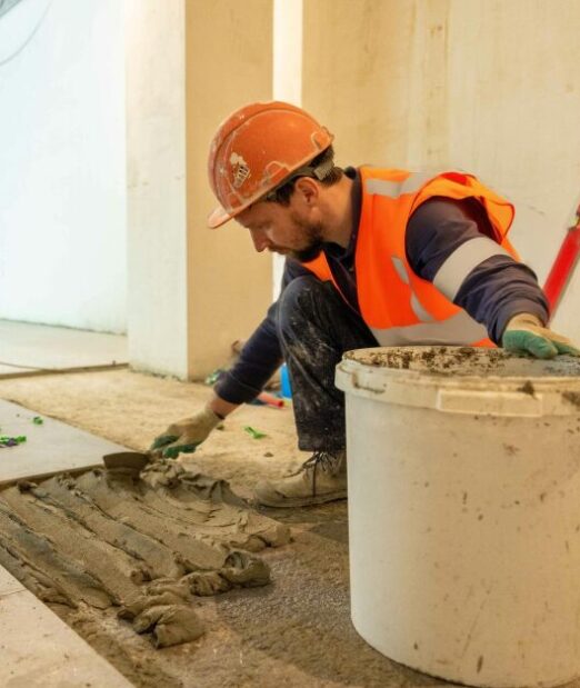 Hills Quarry Products, cement being laid by a builder